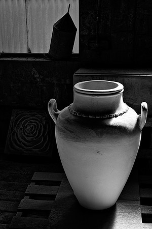 Urn in Window's Light